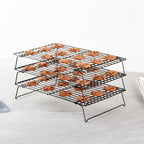 Restaurantware Met Lux 15.7 x 9.8 x 8.3 Inch Wire Baking Rack Set 1 Stackable Oven Wire Rack Set - 3-Tier Design Oven-Ready Up To 392F Black Iron Cooling Rack Set With Collapsible Feet