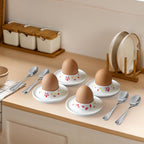 Cinf Ceramic Sakura Egg Holder Set of 4 Porcelain Holder With 4Stainless Steels Egg Spoons Breakfast Boiled Cooking Easy to Clean Childhood Memories Kitchen