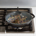 12 Inch Tempered Glass Pot Lid Compatible with 12” Lodge Cast Iron Skillets and 7 Quart Dutch Ovens - Designed with Steam Vent Hole and Heat Resistant Handle