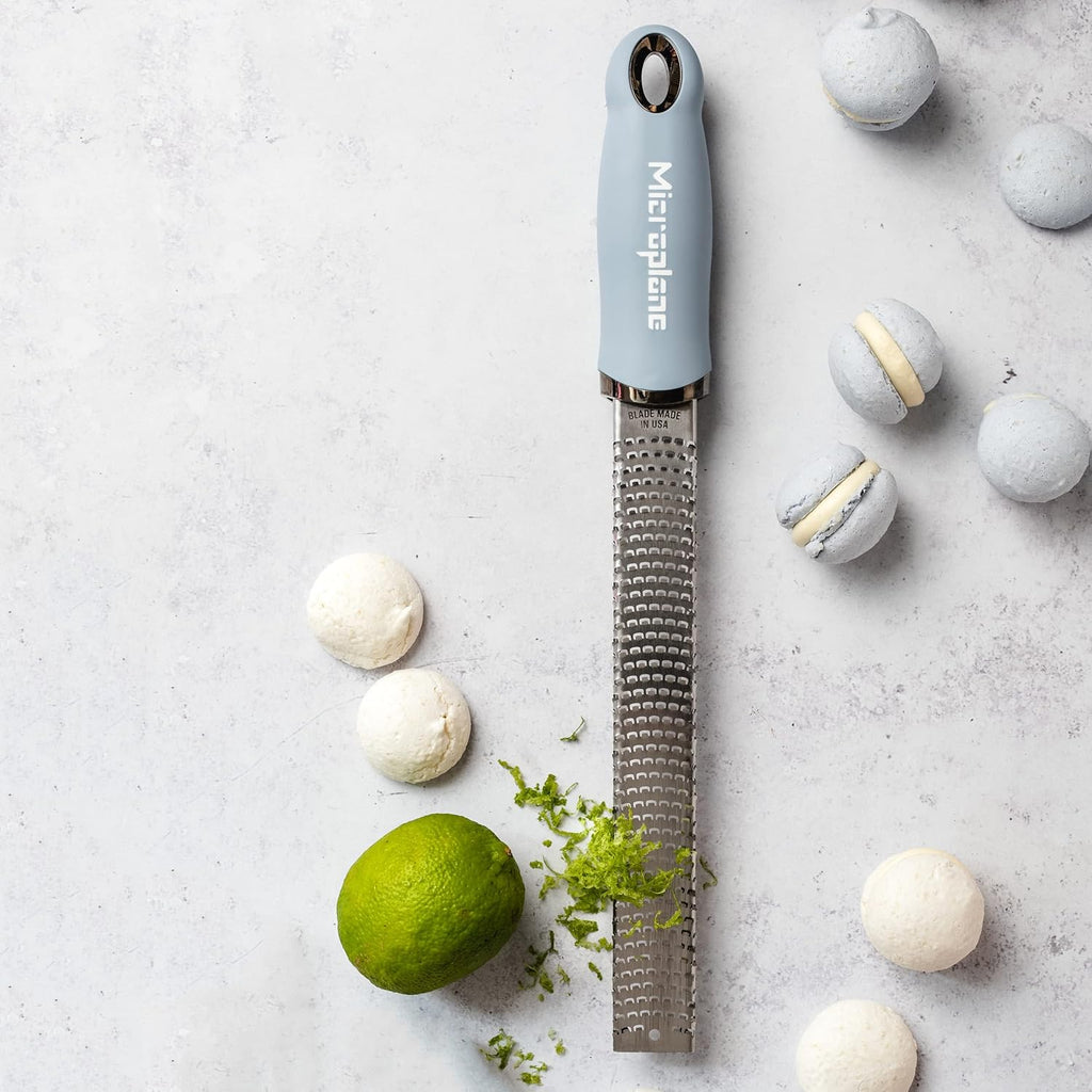 Microplane Zester Grater in Sky Blue for Citrus Fruits, Hard Cheese, Ginger, Chocolate and Nutmeg with Fine Stainless Steel Blade - Made in USA