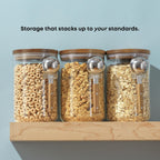 JoyJolt Holden 32oz Stackable Glass Storage Containers with Lids and Scoops, Airtight Food Canister Set of 3 w/Acacia Wood Lids, Round Stacking Pantry and Kitchen Containers w/Scoop | Clear
