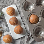 Muffin Cake Pan, Non-Stick 12-Cavity Chestnut-Shaped Bakeware for Oven Baking (Champagne Gold)