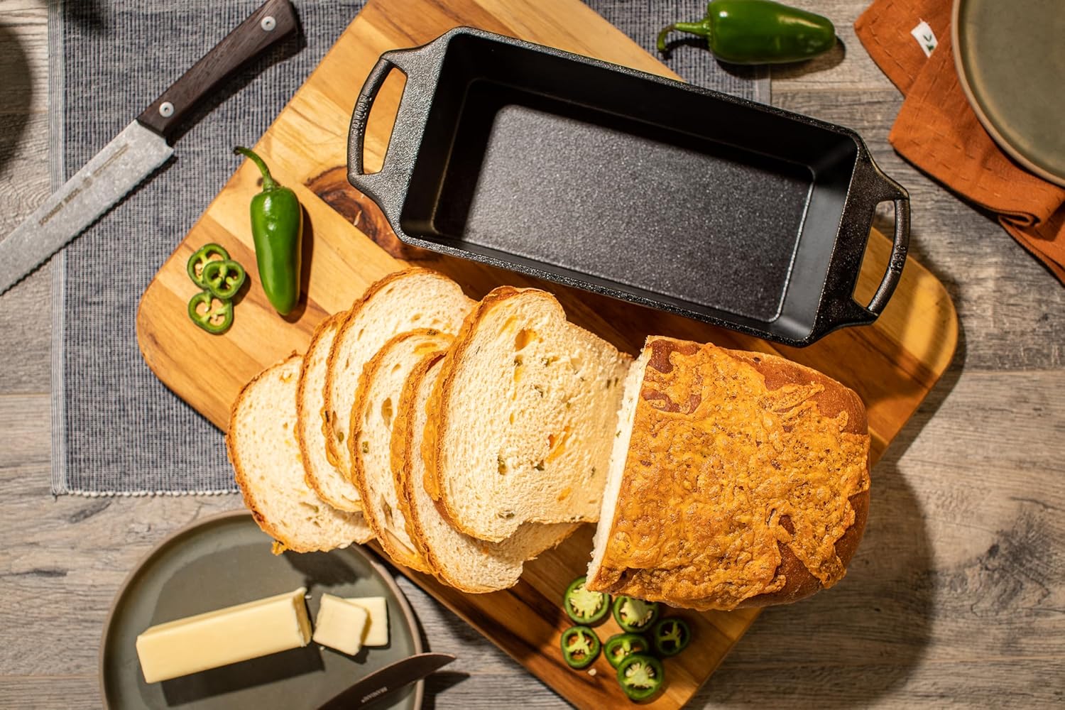 Lodge 10 Inch Pre-Seasoned Cast Iron Loaf Pan - Dual Handles - Unparalleled Heat Retention for Consistent, Even Baking - Black